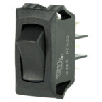 Black rocker switch with four metal pins