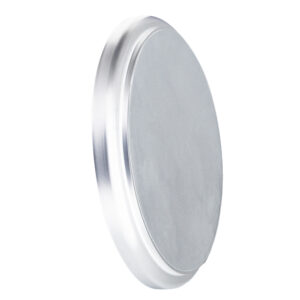Empty round metal tin with lid.