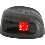 Compact barcode scanner with red light indicator.