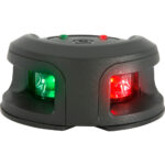 Black scanner with red and green lights on.