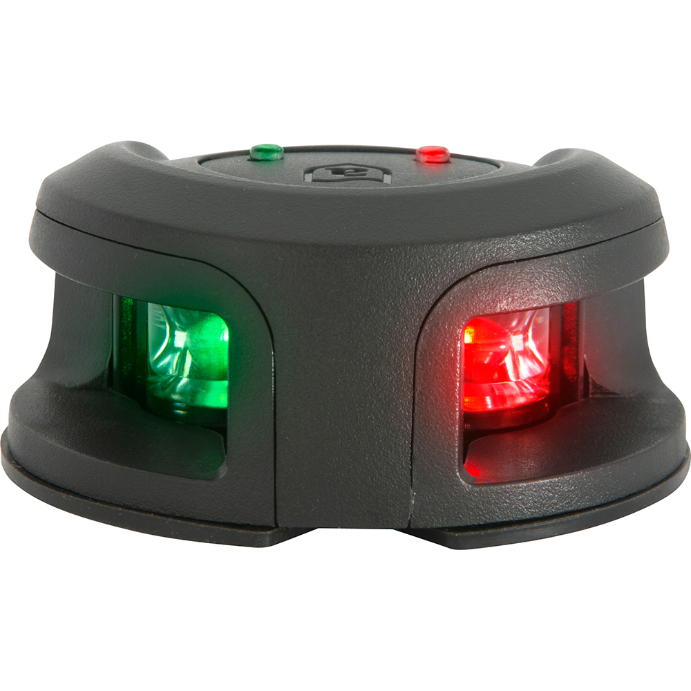 Black scanner with red and green lights on.