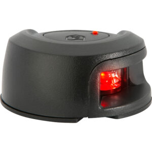 Black electronic device with glowing red light.