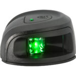 Barcode scanner with green light on.