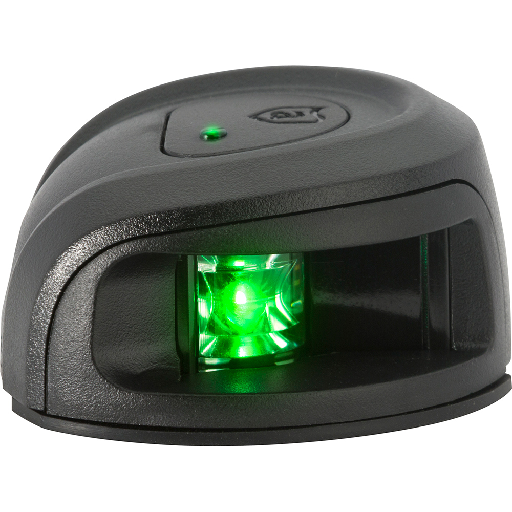 Barcode scanner with green light on.