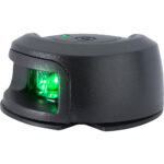 Black barcode scanner with green light indicator
