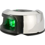 Shiny barcode scanner with green light indicator.