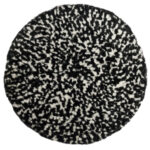 Round black and white patterned rug