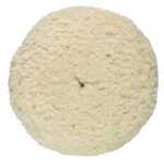 Circular wool buffing pad for polishing surfaces.