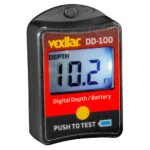 Vexilar DD-100 depth gauge showing 10.2 feet.