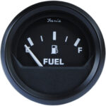 Analog fuel gauge showing quarter full.