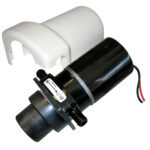 Electric marine toilet pump assembly with cover.