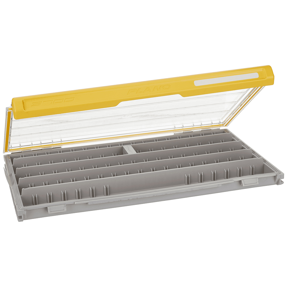 Open yellow tackle box with compartments for organization.