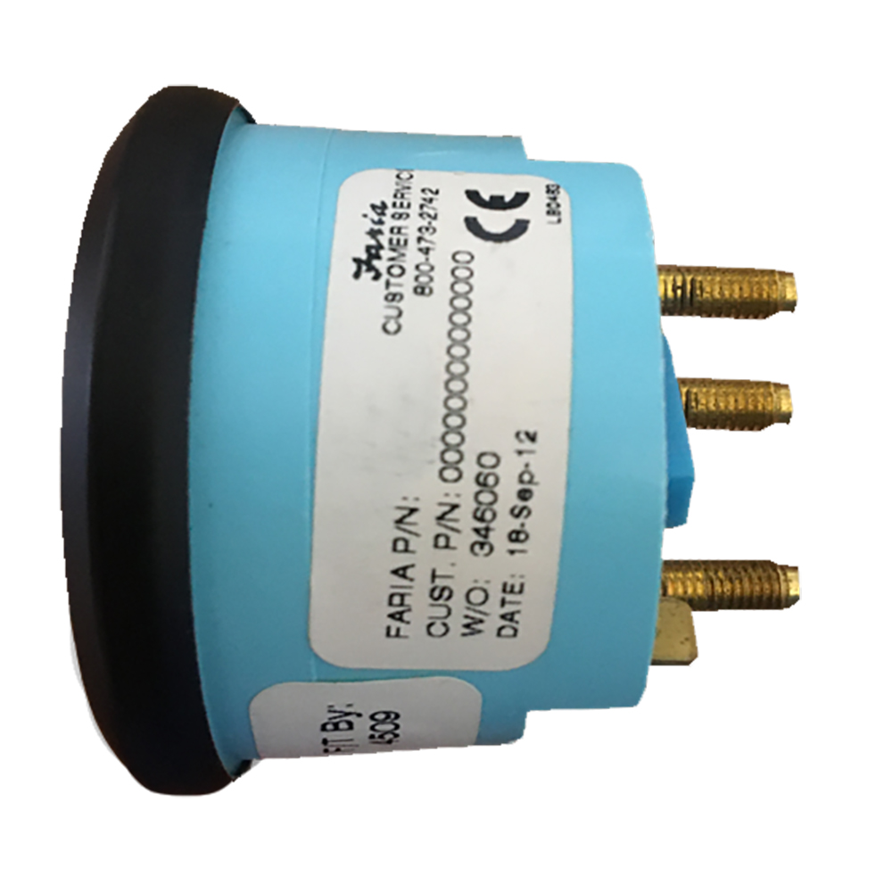 Blue Faria gauge component with serial number label.