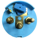 Blue electrical component with brass terminals.
