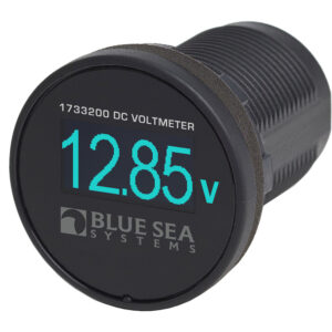 Digital voltmeter displaying 12.85 volts