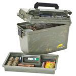 Green storage box with tray and tools inside.