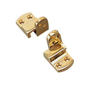 Two shiny gold cabinet hinges