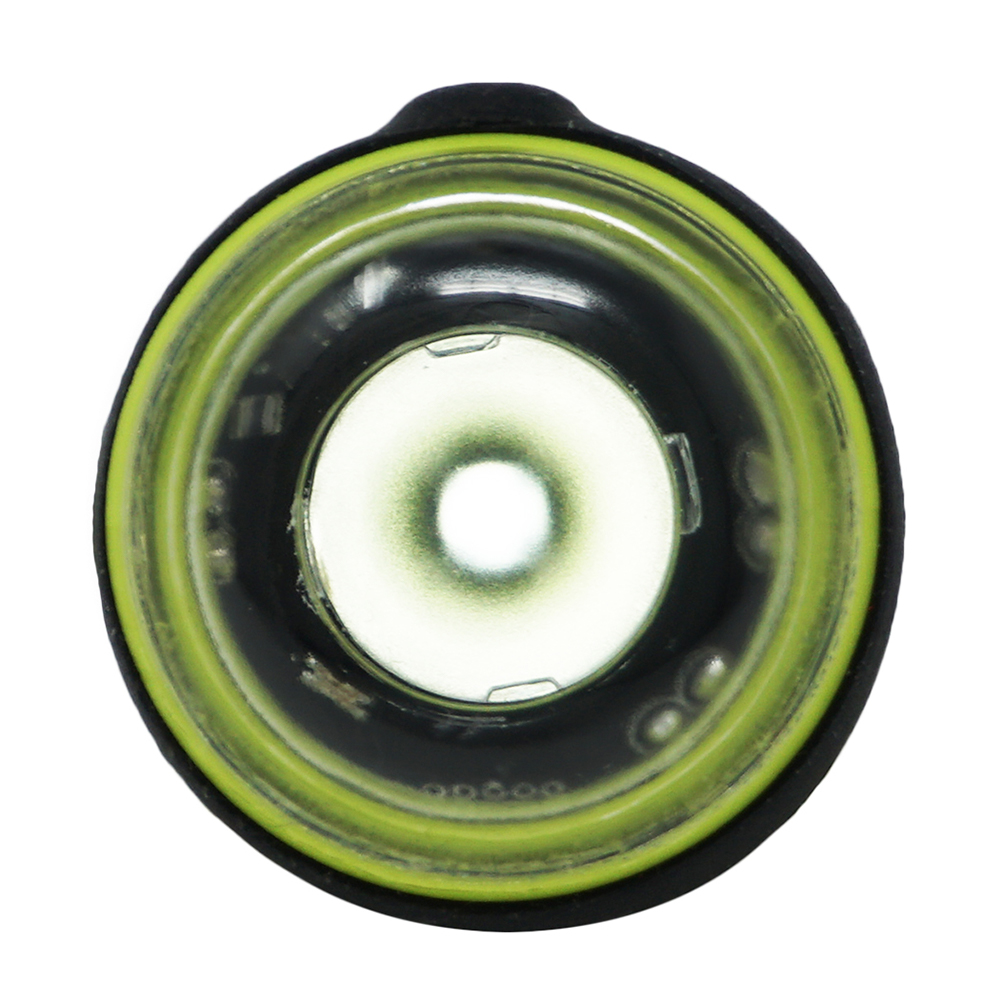 Close-up of flashlight lens and bulb.