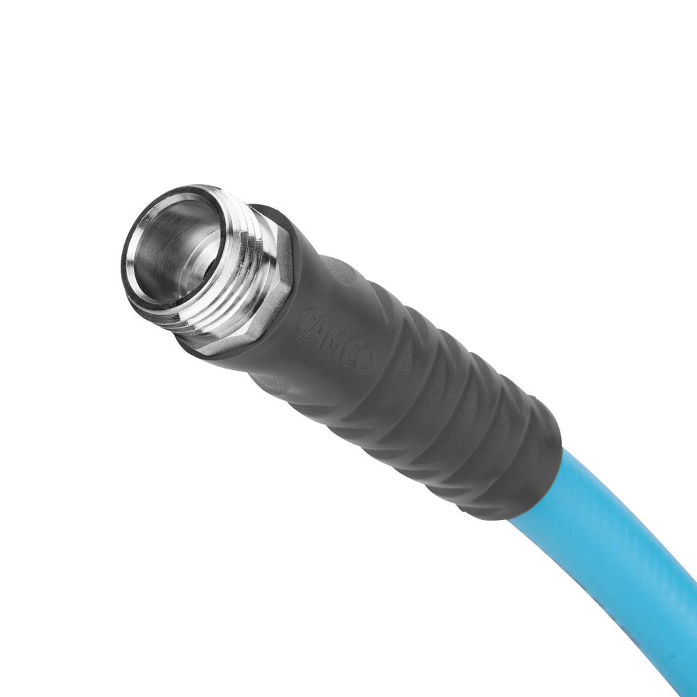 Close-up of blue water hose connector.