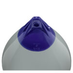 Gray buoy with purple top, close-up view.