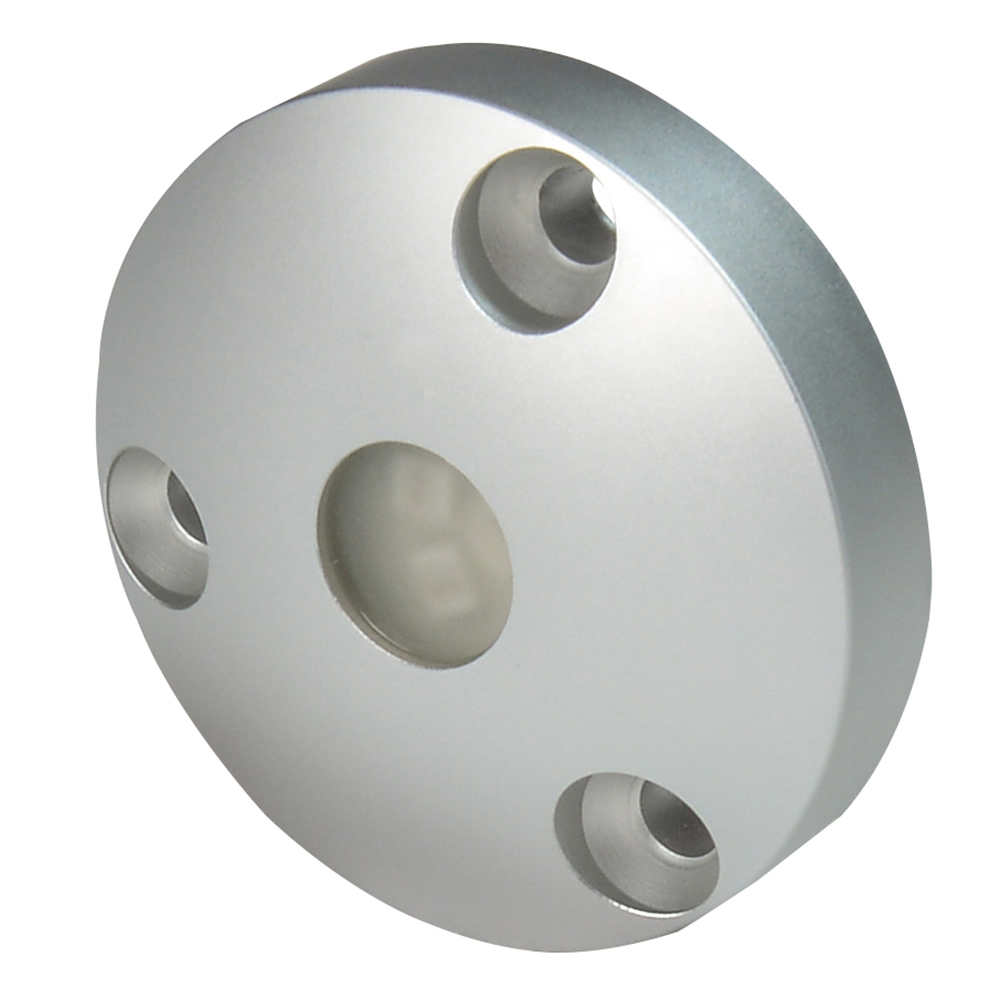 Silver metallic component with holes