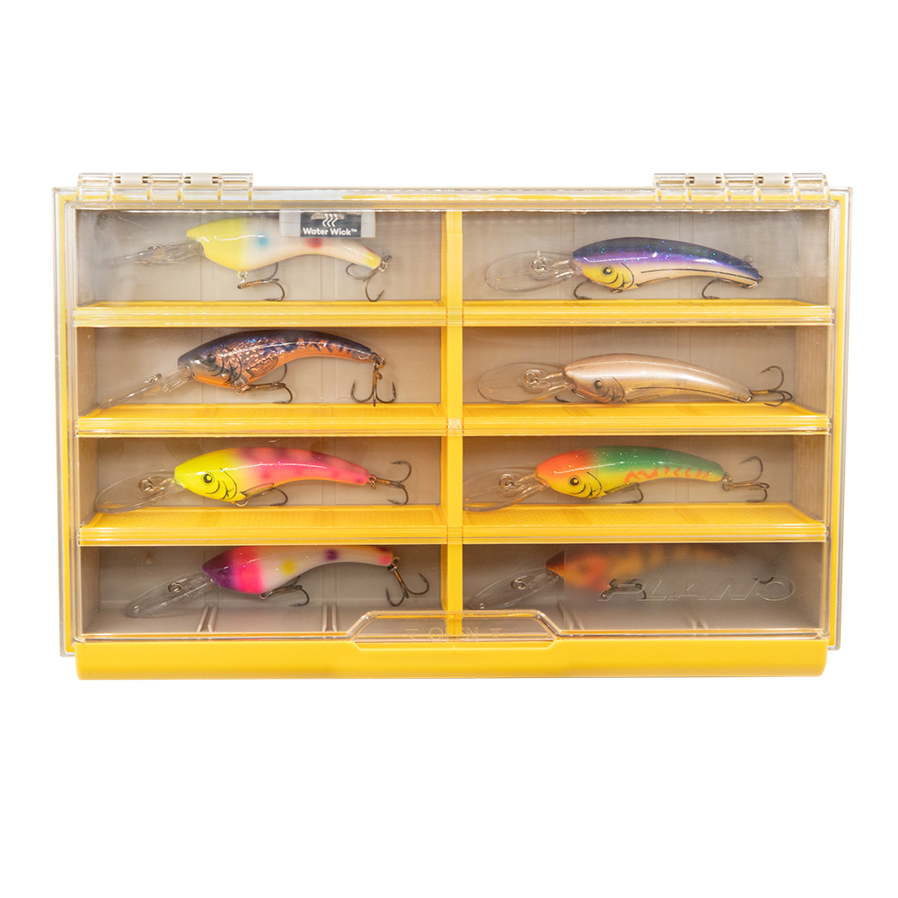 Box of colorful fishing lures with hooks