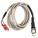 Coiled gray electrical cable with connectors.