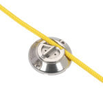 Quick cleat with yellow rope secured in place.