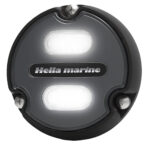 Round Hella marine boat light, black casing.