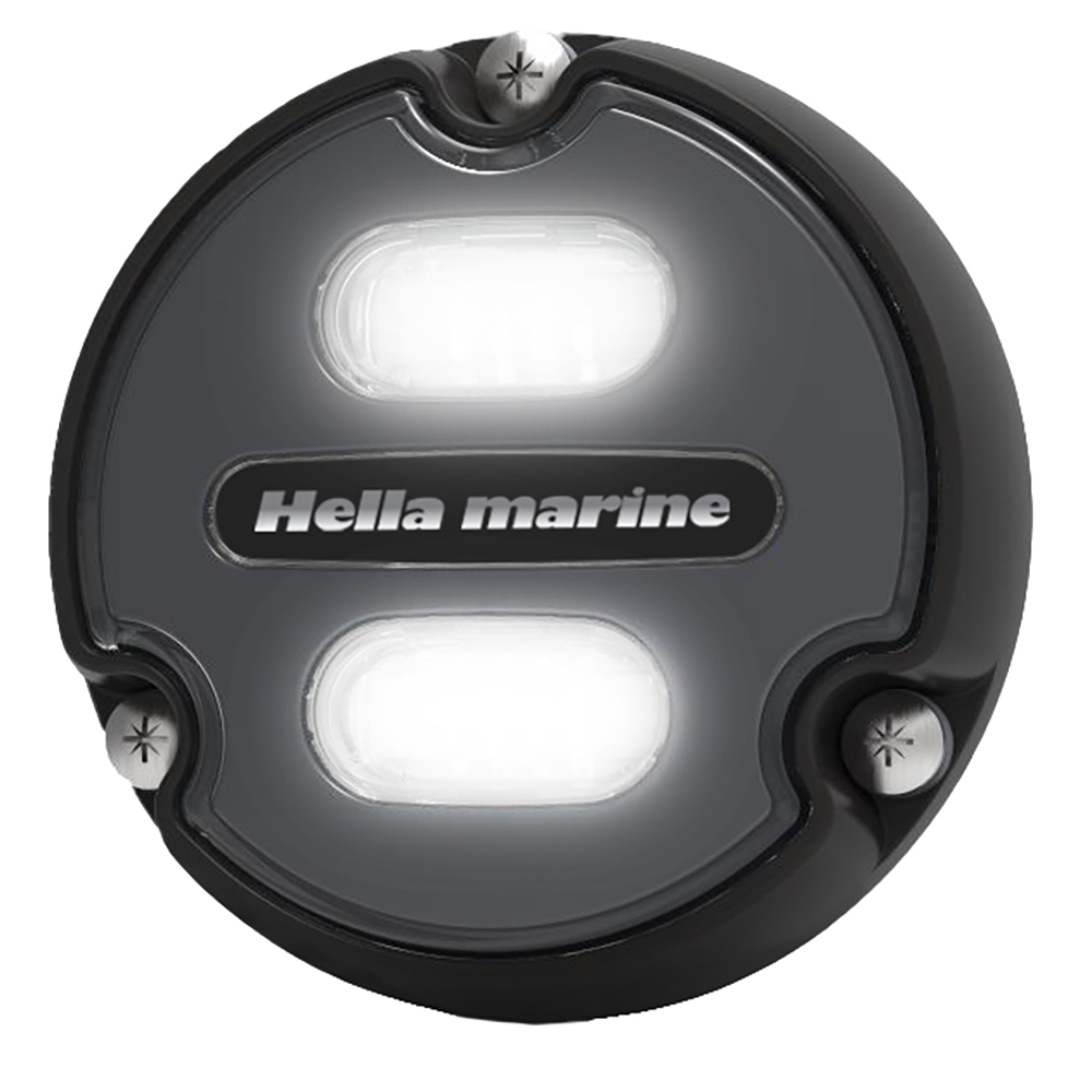 Round Hella marine boat light, black casing.