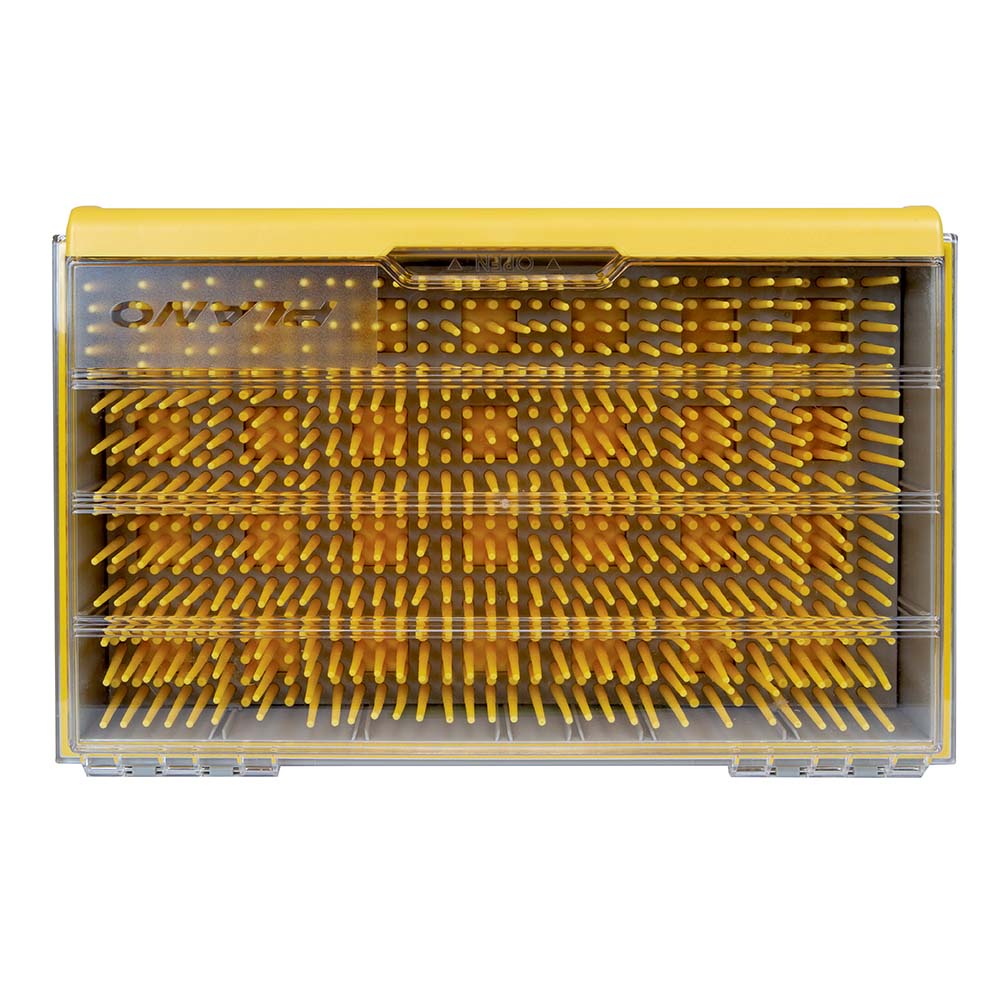 Yellow dental brush storage case with transparent lid.