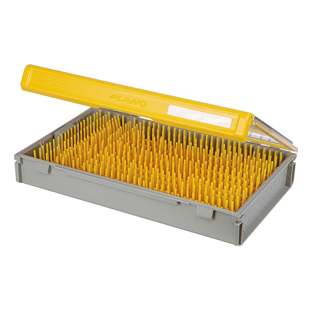 Yellow tool organizer with open lid and spikes