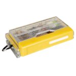 Yellow fishing tackle box with transparent lid.