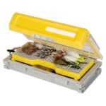 Fishing tackle box with various artificial flies.