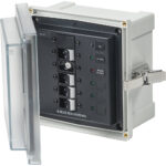 Marine electrical panel with circuit breakers.