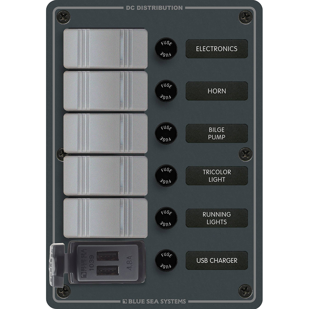 DC distribution panel with labeled switches and fuses