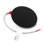 Black circular wireless charging pad with cable