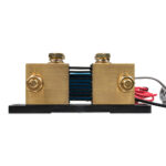 Electronic brass shunt with wires and connectors.