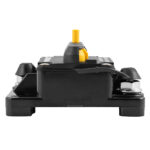 Black circuit breaker with yellow switch component.
