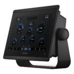 Garmin marine display showing speed, fuel, voltage data.