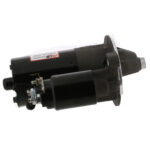 Automotive starter motor on white background