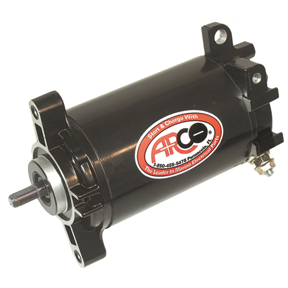 Black marine starter motor on white background.