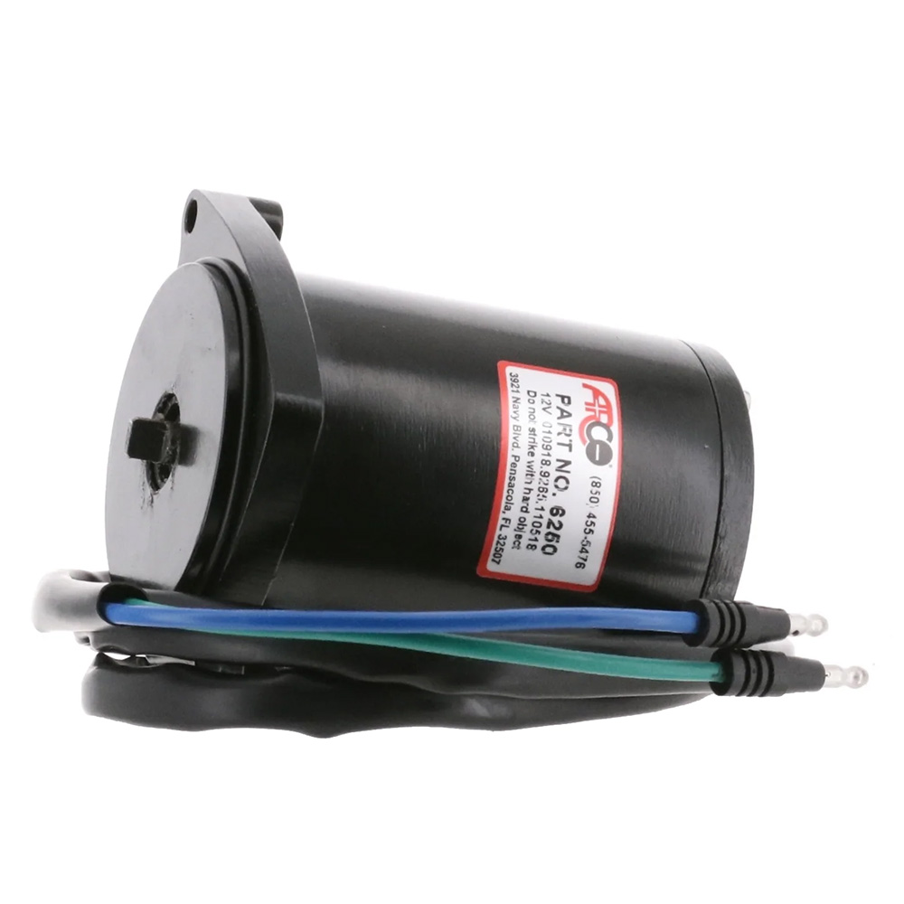 Black electric motor with colored wires close-up.