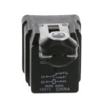 Black auto relay switch with metal terminals.