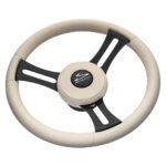 Beige leather steering wheel with metal spokes.