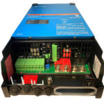 Open blue power inverter with wiring connections.
