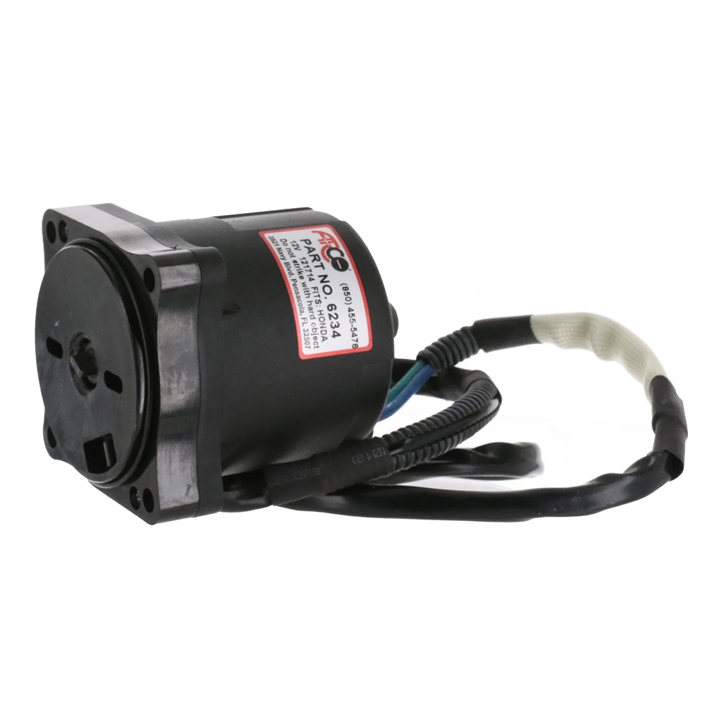 Black electric motor with wires attached.