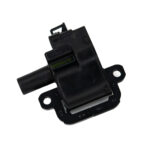 Automotive ignition coil on white background.