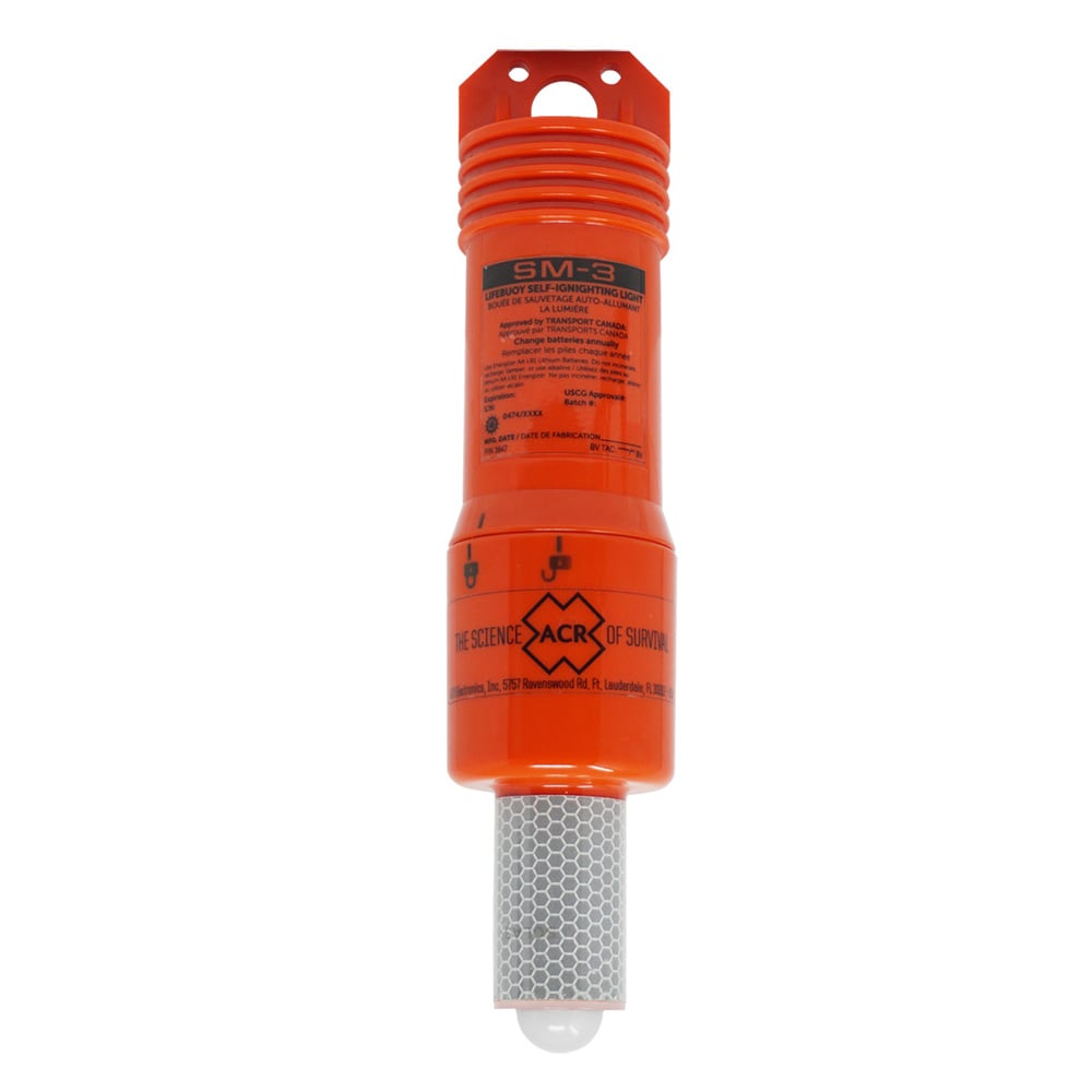 Orange maritime survival light with reflective base.
