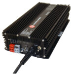 Black DC-to-AC power inverter with cooling fins